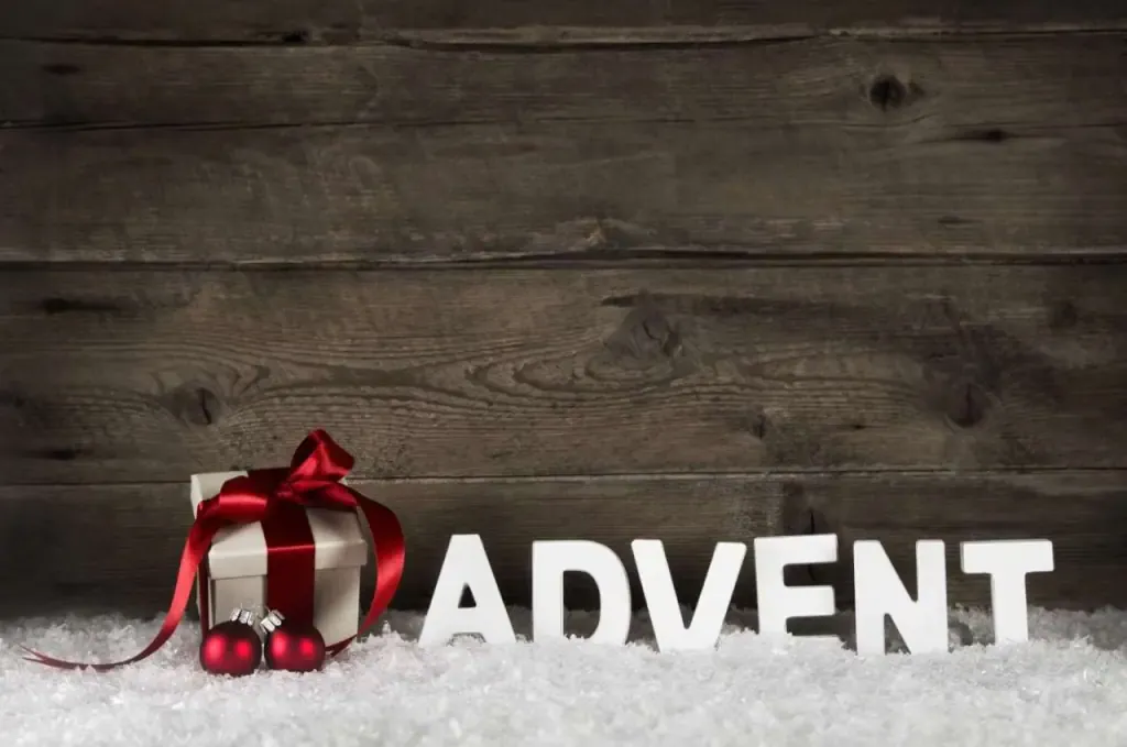 Christmas present or gift with classical red ribbon or bow on ru